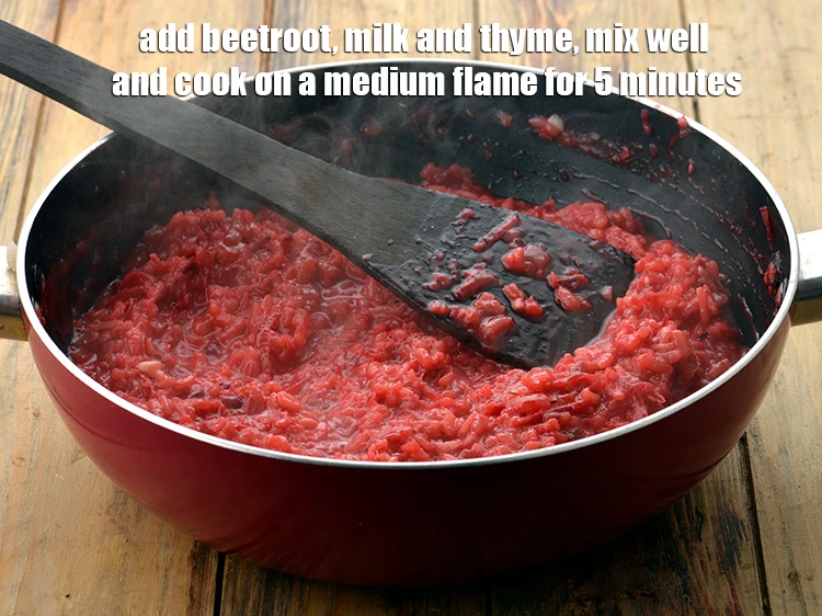 Step 7 – <p><span style="background-color:rgb(255,255,255);color:rgb(0,0,0);">Add the 1 cup </span><a href="https://www.tarladalal.com/glossary-beetroot-chukandar-201i#ing_2407"><u>grated beetroot</u></a><span style="background-color:rgb(255,255,255);color:rgb(0,0,0);">, 1/2 cup </span><a href="https://www.tarladalal.com/glossary-milk-doodh-full-cream-milk-514i"><u>milk</u></a><span style="background-color:rgb(255,255,255);color:rgb(0,0,0);"> and …