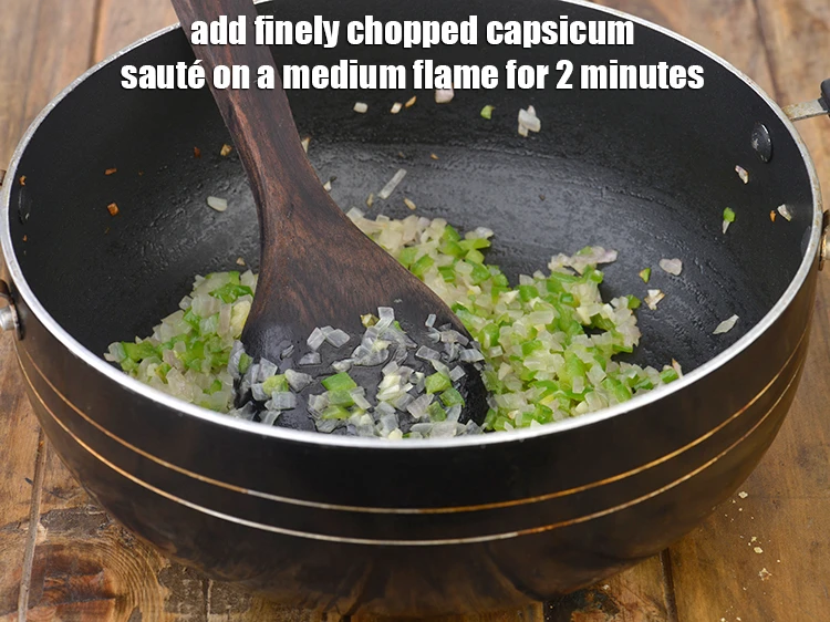 Step 5 – <p><span style="background-color:rgb(255,255,255);color:rgb(0,0,0);">Add the 1/2 cup finely </span><a href="https://www.tarladalal.com/glossary-capsicum-shimla-mirch-bell-pepper-163i#ing_2311"><u>chopped capsicum</u></a><span style="background-color:rgb(255,255,255);color:rgb(0,0,0);"> and <strong>sauté</strong> on a medium …