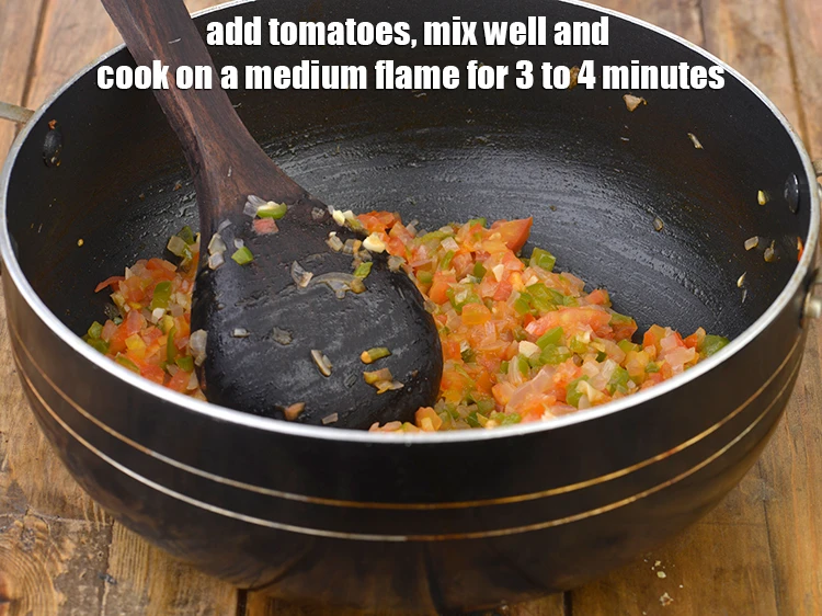 Step 6 – <p><span style="background-color:rgb(255,255,255);color:rgb(0,0,0);">Add the 1 cup finely </span><a href="https://www.tarladalal.com/glossary-tomatoes-tamatar-639i#ing_2361"><u>chopped tomato</u></a><span style="background-color:rgb(255,255,255);color:rgb(0,0,0);">, mix well and cook on …
