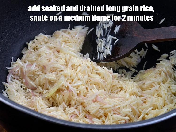 Step 5 – <p>Add <strong>soaked and drained long grain rice (basmati chawal)</strong> <span style="background-color:rgb(255,255,255);color:rgb(0,0,0);">and <strong>sauté</strong> on a medium …
