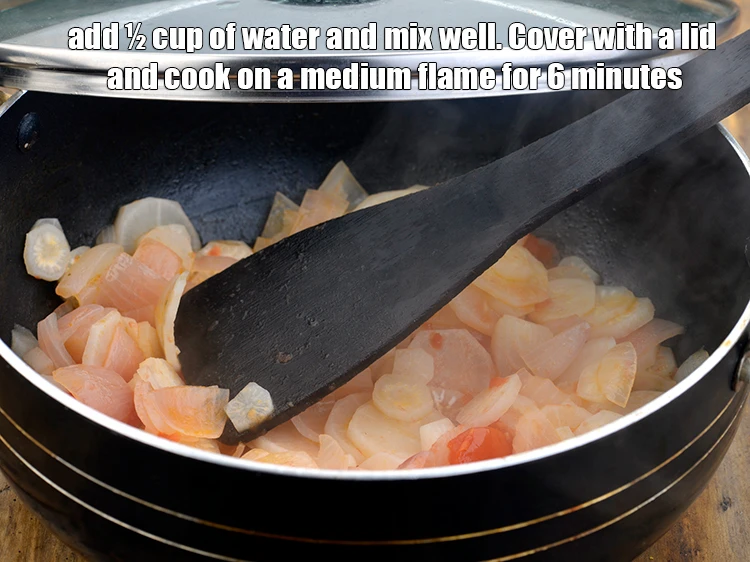 Step 12 – <p><span style="background-color:rgb(255,255,255);color:rgb(0,0,0);">Add ½ cup of<strong> water</strong> and mix well. Cover with a lid and cook …