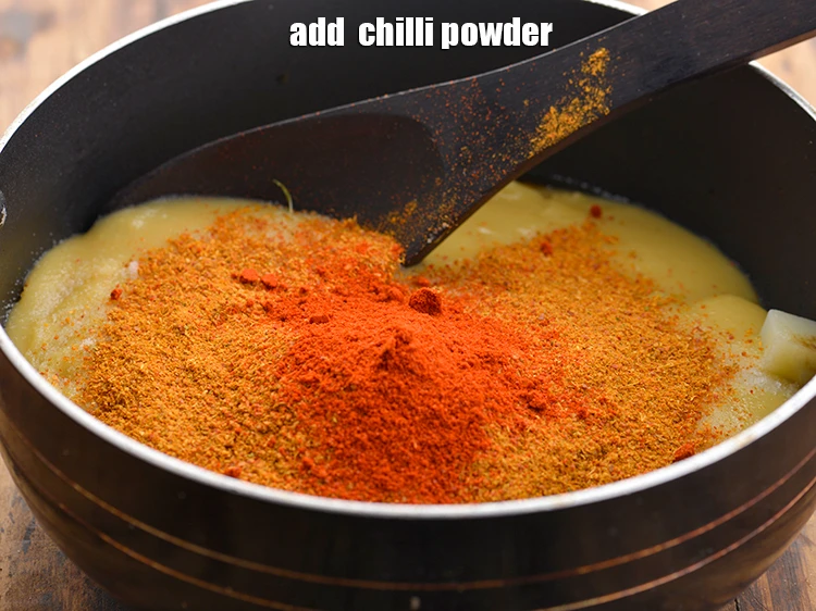 Step 14 – <p><span style="background-color:rgb(255,255,255);color:rgb(0,0,0);">Add the 1 tsp </span><a href="https://www.tarladalal.com/glossary-chilli-powder-red-chilli-powder-339i"><u>chilli powder</u></a>.</p>