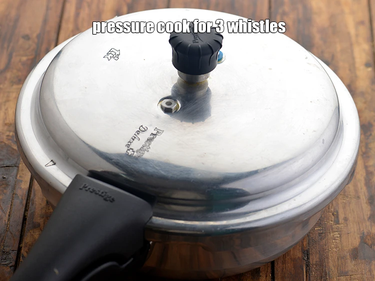 Step 7 – <p><span style="background-color:rgb(255,255,255);color:rgb(0,0,0);">Pressure cook for 3 whistles.</span></p>