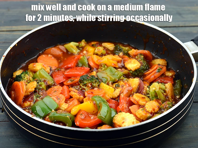 Step 22 – <p><span style="background-color:rgb(255,255,255);color:rgb(0,0,0);">mix well and cook on a medium flame for 2 minutes, while stirring occasionally.</span></p>