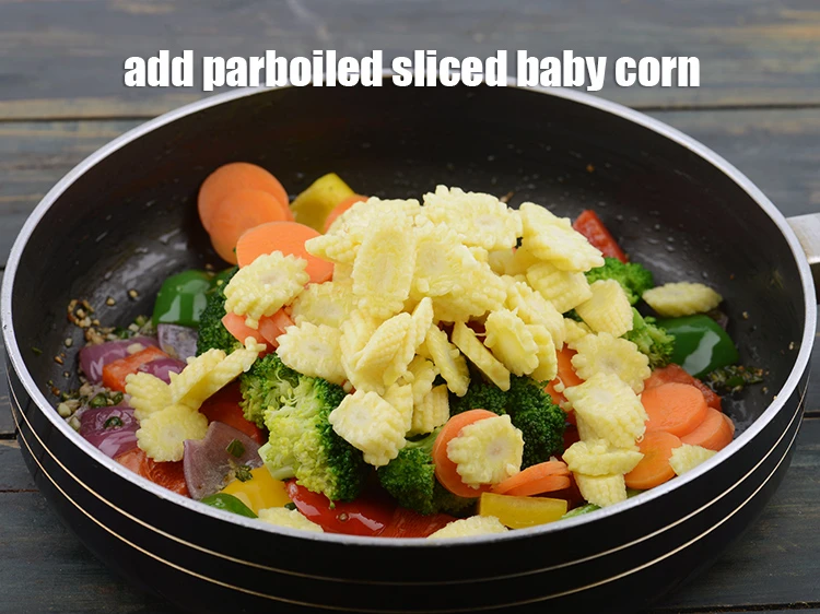 Step 17 – <p>Add 1 cup parboiled &nbsp;<a href="https://www.tarladalal.com/glossary-sliced-baby-corn-751i">sliced baby corn</a>&nbsp;.</p>
