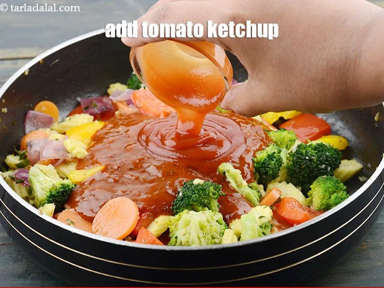 Step 20 – <p>Add 2 tbsp&nbsp;<a href="https://www.tarladalal.com/glossary-tomato-ketchup-tomato-sauce-181i">tomato ketchup</a>.</p>