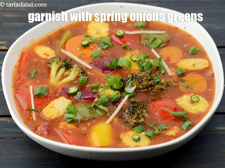 Step 26 – <p>Garnish 2 tbsp&nbsp;finely&nbsp;<a href="https://www.tarladalal.com/glossary-chopped-spring-onion-greens-1030i">chopped spring onion greens</a>.</p>