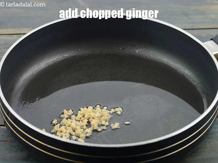 Step 7 – <p>Add 2&nbsp;tsp&nbsp;finely&nbsp;<a href="https://www.tarladalal.com/glossary-chopped-ginger-786i">chopped ginger (adrak)</a></p>