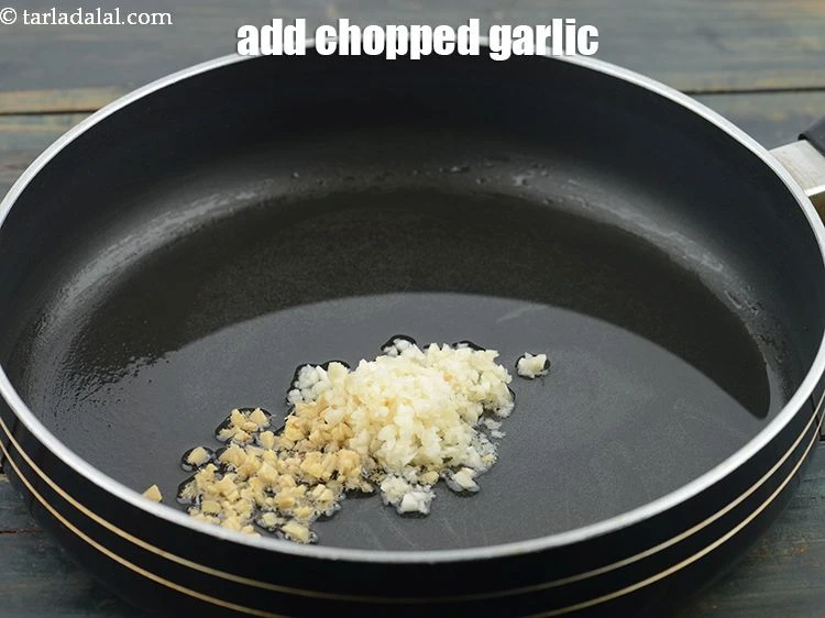 Step 8 – <p>Add 2 tsp&nbsp;<a href="https://www.tarladalal.com/glossary-chopped-garlic-790i">chopped garlic (lehsun)</a></p>