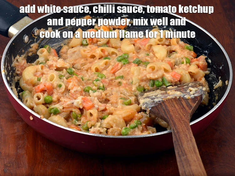 Step 4 – <p><span style="background-color:rgb(255,255,255);color:rgb(0,0,0);">Add the 2 cups </span><a href="https://www.tarladalal.com/white-sauce---for-baking-113r"><u>white sauce&nbsp;</u></a><span style="background-color:rgb(255,255,255);color:rgb(0,0,0);">, 2 tsp </span><a href="https://www.tarladalal.com/glossary-red-chilli-sauce-lal-chilli-sauce-810i"><u>red chilli sauce</u></a><span …