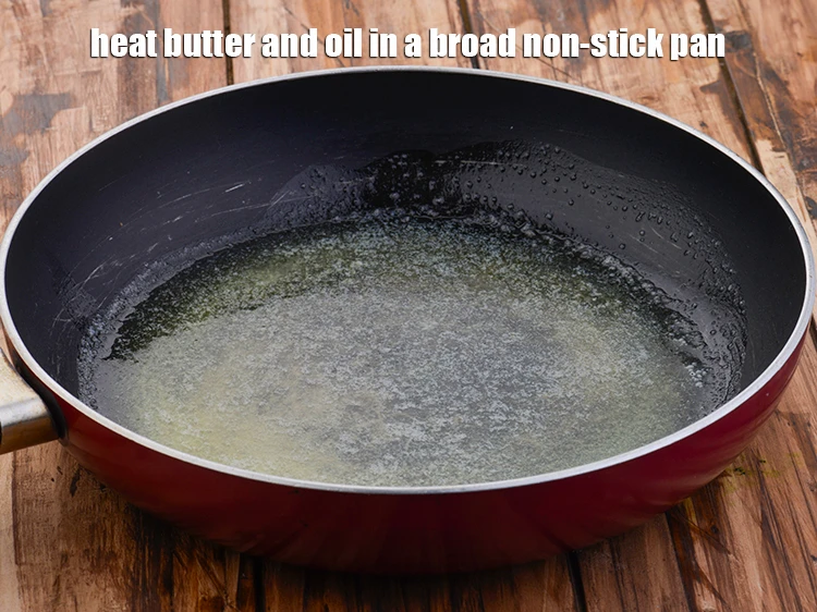 Step 2 – <p><span style="background-color:rgb(255,255,255);color:rgb(0,0,0);">Heat the 2 tsp </span><a href="https://www.tarladalal.com/glossary-butter-makhan-233i"><u>butter</u></a><span style="background-color:rgb(255,255,255);color:rgb(0,0,0);"> and 1 tsp </span><a href="https://www.tarladalal.com/glossary-oil-671i"><u>oil</u></a><span style="background-color:rgb(255,255,255);color:rgb(0,0,0);"> in …