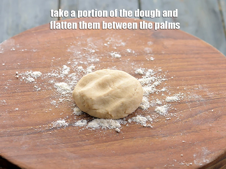 Step 14 – <p><span style="background-color:rgb(255,255,255);color:rgb(0,0,0);">To make the <strong>Stuffed Methi Parathas</strong>, take a portion of the dough and flatten …