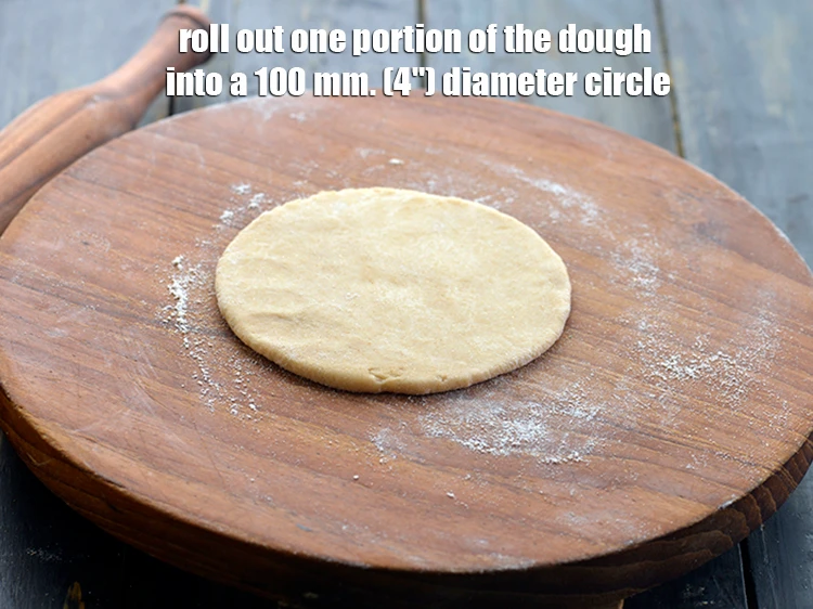 Step 15 – <p>Roll out one portion of the dough into a 100 mm. (4") diameter circle using …