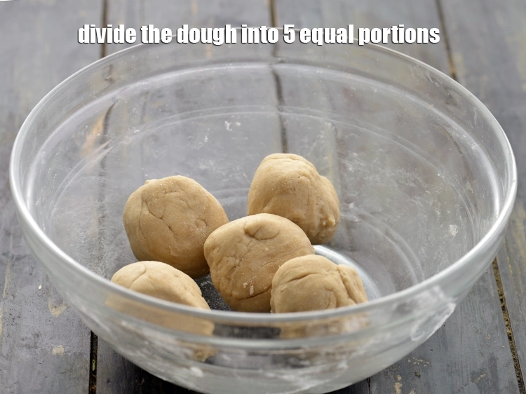 Step 7 – <p>Divide the <strong>dough</strong> into 5 equal portions and keep aside.</p>
