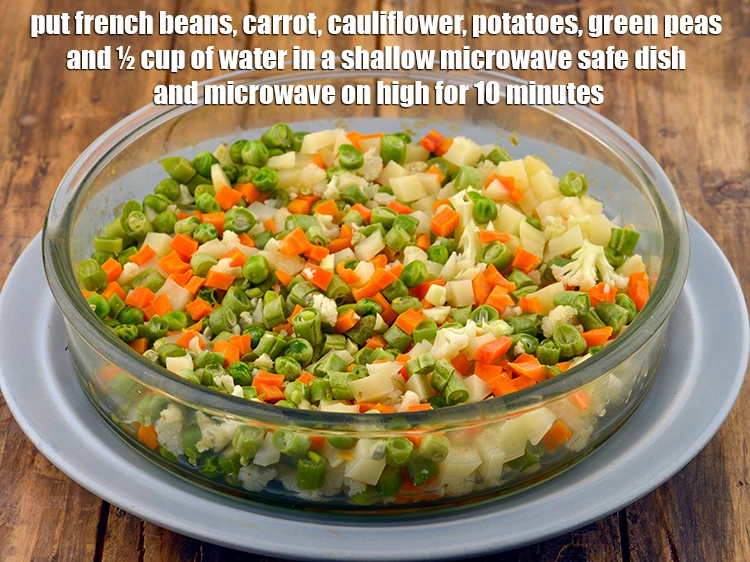 Step 4 – <p><span style="background-color:rgb(255,255,255);color:rgb(0,0,0);">Combine the 1/2 cup </span><a href="https://www.tarladalal.com/glossary-French-beans-fansi-196i#ing_2375"><u>chopped french beans</u></a><span style="background-color:rgb(255,255,255);color:rgb(0,0,0);">, 1/2 cup </span><a href="https://www.tarladalal.com/glossary-carrot-gajar-gajjar-253i#ing_2376"><u>chopped carrot</u></a><span …