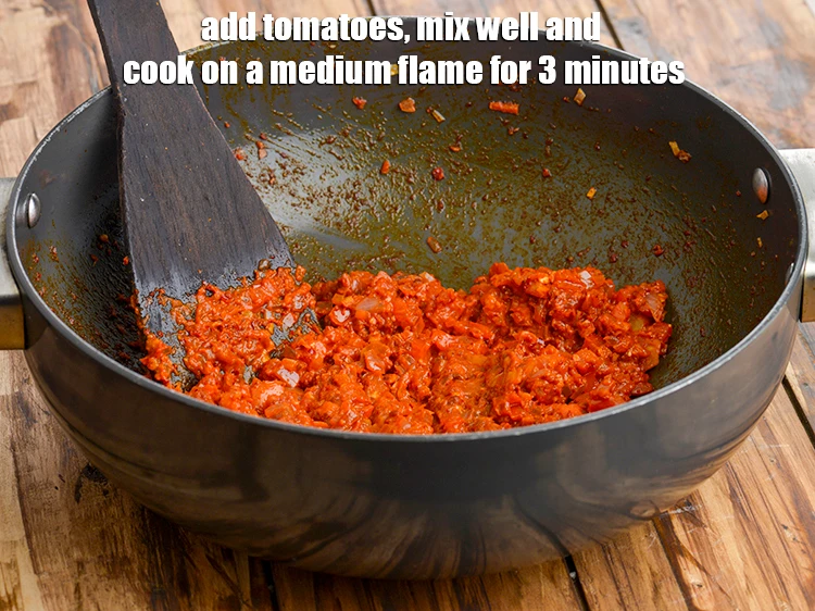 Step 15 – <p><span style="background-color:rgb(255,255,255);color:rgb(0,0,0);">Add the 1/2 cup finely </span><a href="https://www.tarladalal.com/glossary-tomatoes-tamatar-639i#ing_2361"><u>chopped tomato</u></a><span style="background-color:rgb(255,255,255);color:rgb(0,0,0);">, mix well and <strong>cook</strong> on …