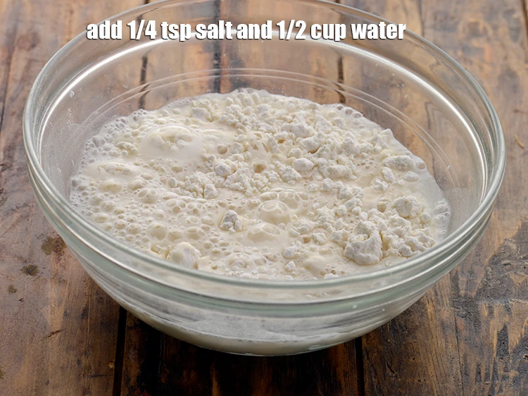 Step 5 – <p>Add <span style="background-color:rgb(255,255,255);color:rgb(0,0,0);">1/4 tsp </span><a href="https://www.tarladalal.com/glossary-salt-namak-table-salt-418i"><u>salt</u></a><u>.</u> <span style="background-color:rgb(255,255,255);color:rgb(0,0,0);">and 1/2 cup </span><a href="https://www.tarladalal.com/glossary-water-pani-647i"><u>water</u></a><u>.</u></p>