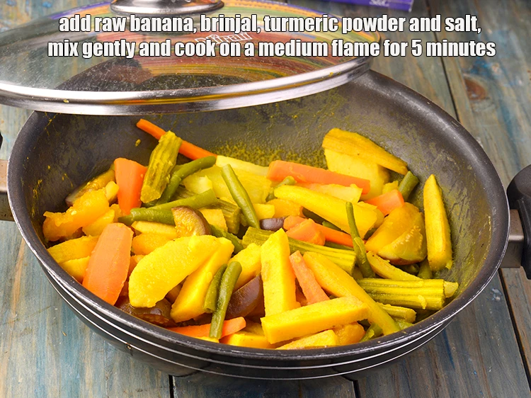 Step 9 – <p><span style="background-color:rgb(255,255,255);color:rgb(0,0,0);">Add the 1/2 cup </span><a href="https://www.tarladalal.com/glossary-raw-banana-kacha-kela-plantain-25i"><u>raw banana </u></a><span style="background-color:rgb(255,255,255);color:rgb(0,0,0);">, cut into 75 mm. (3'') …