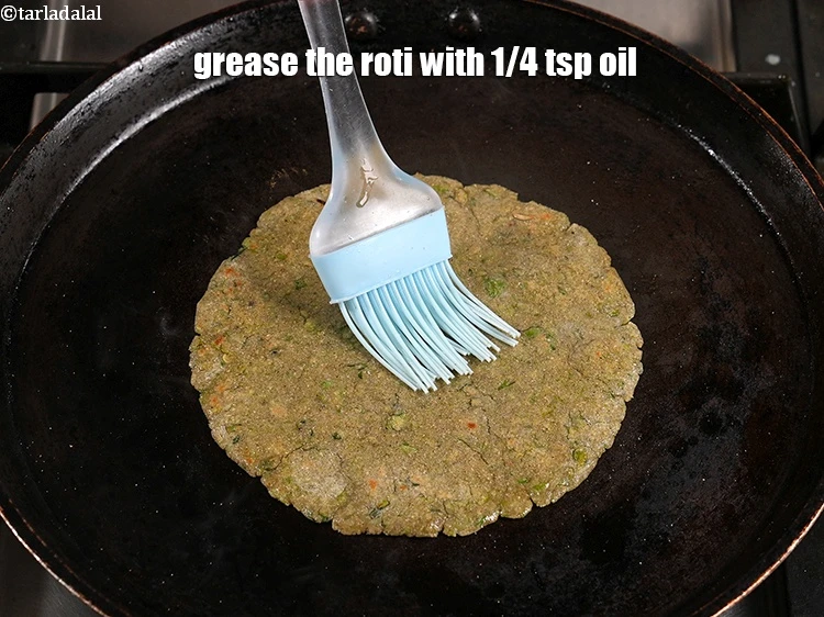 Step 19 – <p>Grease the roti with 1/4 tsp oil.</p>
