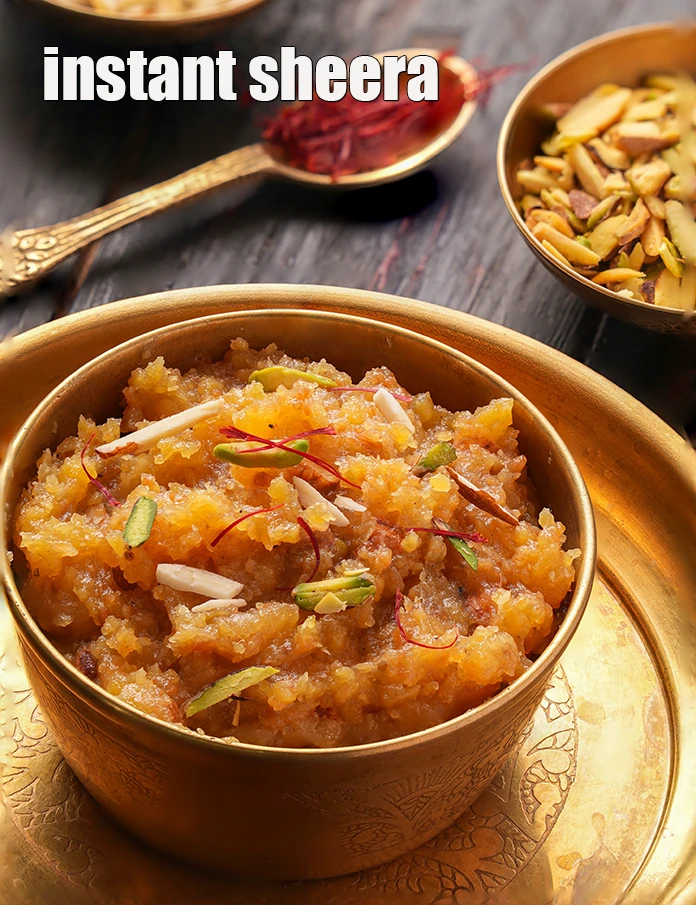 Step 31 – <p>Serve <strong>quick moong dal sheera&nbsp;| instant sheera | 20 minute sheera |</strong>&nbsp;hot garnished with almond …