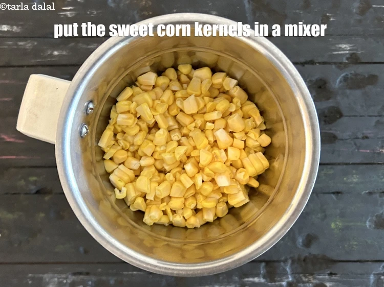 Step 3 – <p><span style="background-color:rgb(255,255,255);color:rgb(0,0,0);">Put the </span><a href="https://www.tarladalal.com/glossary-sweet-corn-kernels-makai-ke-dane-156i#ing_2480"><u>sweet corn kernels (makai ke dane)</u></a><span style="background-color:rgb(255,255,255);color:rgb(0,0,0);"> into a mixer. You …