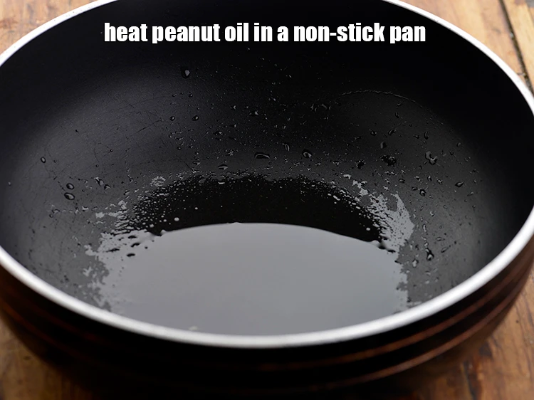 Step 10 – <p>Heat the <span style="background-color:rgb(255,255,255);color:rgb(0,0,0);">1 tsp </span><a href="https://www.tarladalal.com/glossary-peanut-oil-groundnut-oil-sing-tel-920i"><u>peanut oil</u></a> in a non-stick pan.</p>