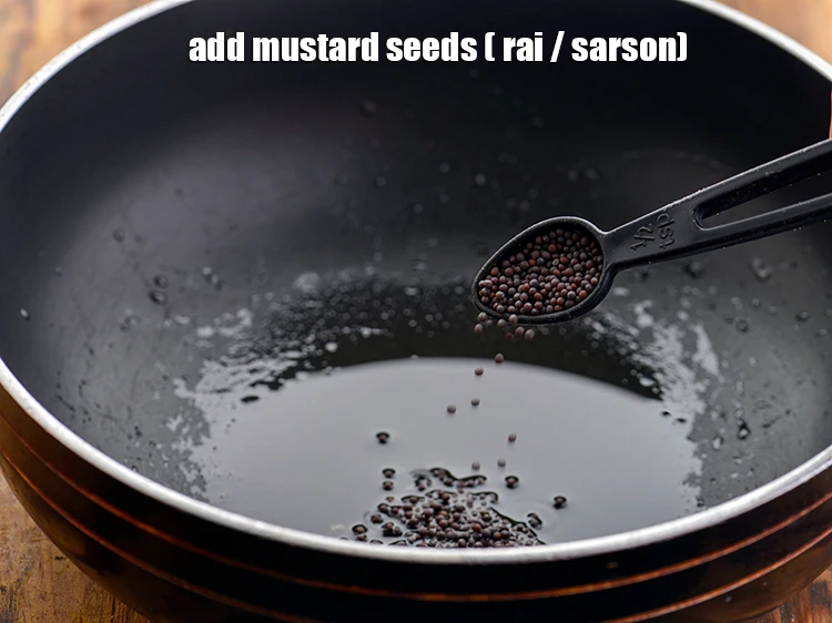 Step 11 – <p>Once the oil is hot, add <span style="background-color:rgb(255,255,255);color:rgb(0,0,0);">1/2 tsp </span><a href="https://www.tarladalal.com/glossary-mustard-seeds-sarson-rai-sarson-ke-beej-525i"><u>mustard seeds ( rai / …
