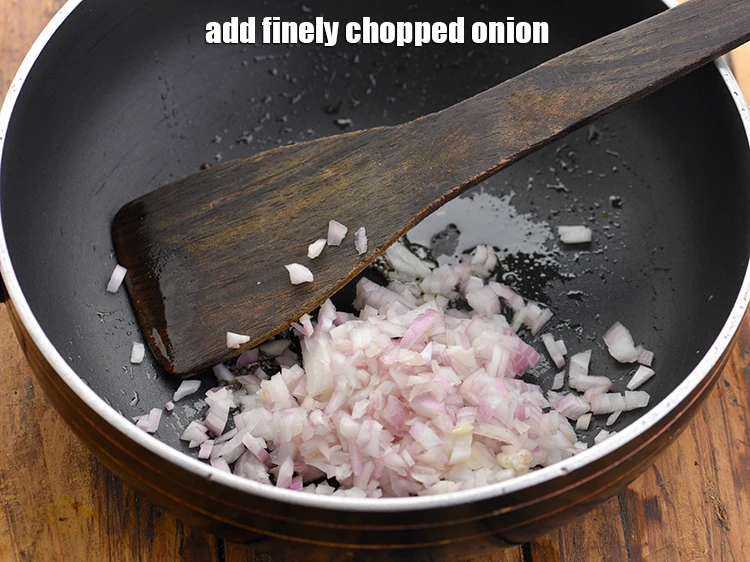 Step 12 – <p>When the seeds crackle, add <span style="background-color:rgb(255,255,255);color:rgb(0,0,0);">1/2 cup finely </span><a href="https://www.tarladalal.com/glossary-onions-pyaz-pyaaz-kanda-548i#ing_2327"><u>chopped onion</u></a>.</p>