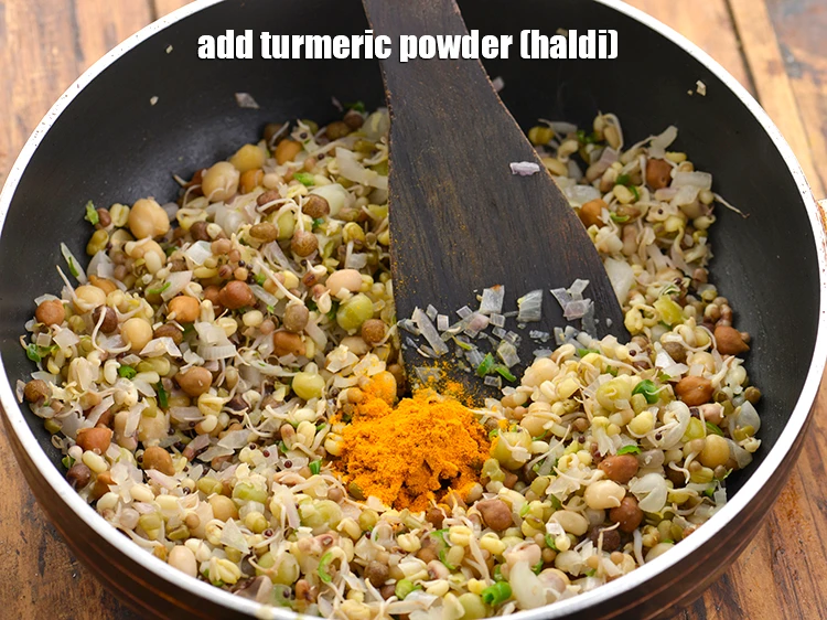 Step 17 – <p>Add the <span style="background-color:rgb(255,255,255);color:rgb(0,0,0);">1/2 tsp </span><a href="https://www.tarladalal.com/glossary-turmeric-powder-haldi-645i"><u>turmeric powder (haldi)</u></a>. To make the&nbsp;<strong>Mixed Sprouts Poha</strong>&nbsp;spicier, add …