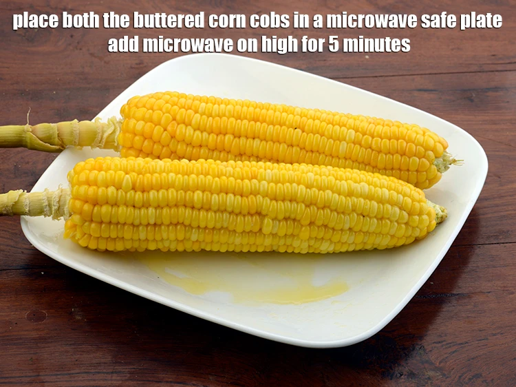Step 2 – <p><span style="background-color:rgb(255,255,255);color:rgb(0,0,0);">Place both the <strong>buttered corn cobs</strong> in a microwave safe plate ad <strong>microwave</strong> on …