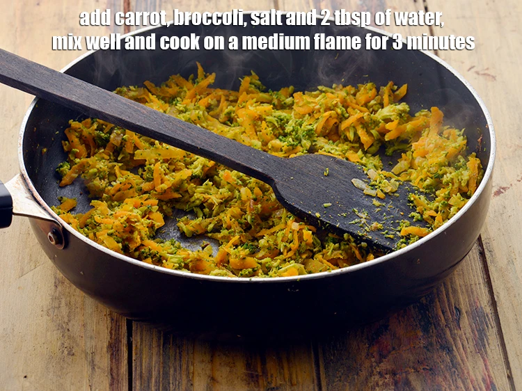 Step 14 – <p><span style="background-color:rgb(255,255,255);color:rgb(0,0,0);">Add the 1/2 cup </span><a href="https://www.tarladalal.com/glossary-carrot-gajar-gajjar-253i#ing_2385"><u>grated carrot</u></a><span style="background-color:rgb(255,255,255);color:rgb(0,0,0);">, 3/4 cup </span><a href="https://www.tarladalal.com/glossary-broccoli-232i#ing_2446"><u>grated broccoli</u></a><span style="background-color:rgb(255,255,255);color:rgb(0,0,0);">, …