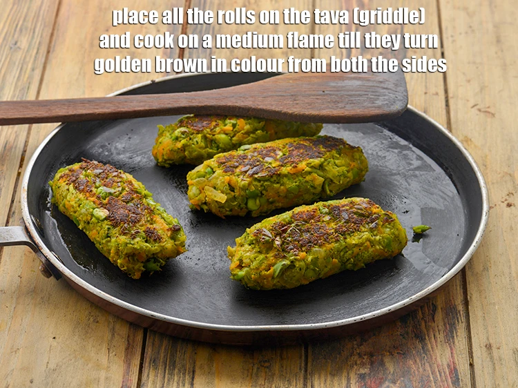 Step 19 – <p><span style="background-color:rgb(255,255,255);color:rgb(0,0,0);">Place all the <strong>rolls</strong> on the tava (griddle) and <strong>cook</strong> on a medium flame …