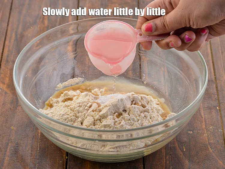 Step 2 – <p><span style="background-color:rgb(255,255,255);color:rgb(0,0,0);">Slowly add <strong>water</strong> little by little.</span></p>