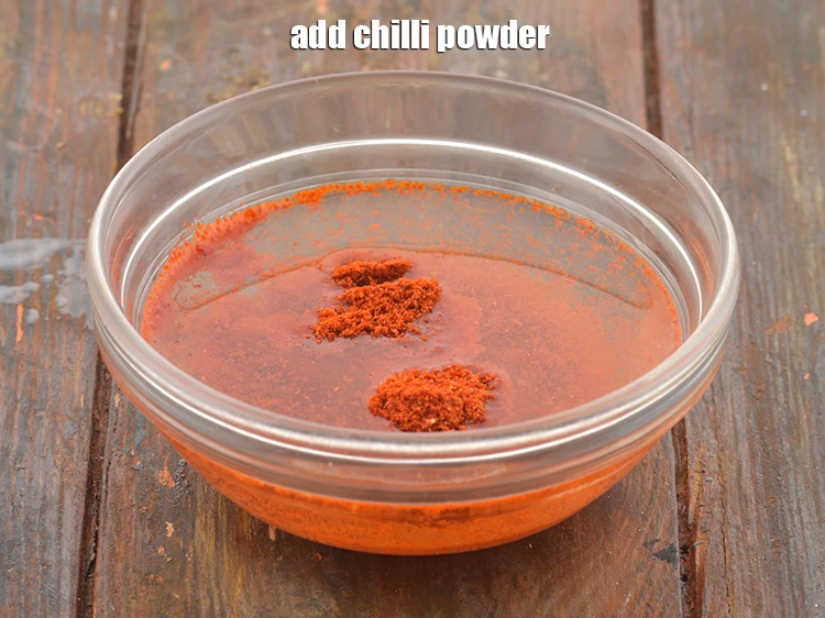 Step 21 – <p><span style="background-color:rgb(255,255,255);color:rgb(0,0,0);">Add the 1 tsp </span><a href="https://www.tarladalal.com/glossary-chilli-powder-red-chilli-powder-339i"><u>chilli powder</u></a><span style="background-color:rgb(255,255,255);color:rgb(0,0,0);"> for the spice.</span></p>