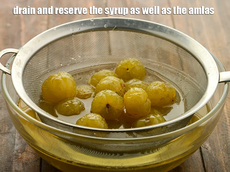 Step 17 – <p><span style="background-color:rgb(255,255,255);color:rgb(0,0,0);">Drain and reserve the syrup as well as the amlas.</span></p>