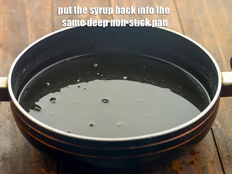 Step 18 – <p><span style="background-color:rgb(255,255,255);color:rgb(0,0,0);">Put the <strong>syrup back</strong> into the same deep non-stick pan.</span></p>