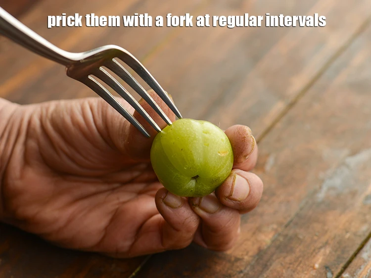 Step 4 – <p>Prick them with a fork at regular intervals.</p>