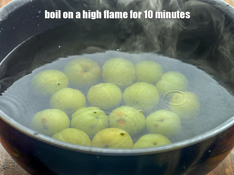 Step 7 – <p>Add the <a href="https://www.tarladalal.com/glossary-amla-Indian-gooseberry-49i"><u>amla (Indian gooseberries)</u></a><u>. </u>Boil on a high flame for 10 minutes. Pierce …