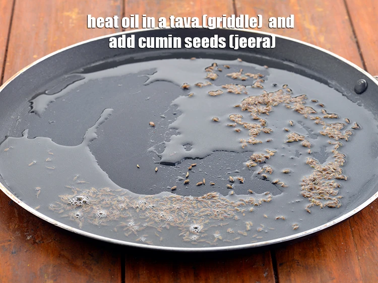 Step 2 – <p>To make&nbsp;<strong>dry paneer bhurji,&nbsp;</strong>first heat the <span style="background-color:rgb(255,255,255);color:rgb(0,0,0);">2 tbsp </span><a href="https://www.tarladalal.com/glossary-oil-671i"><u>oil</u></a> in a tava (griddle) …