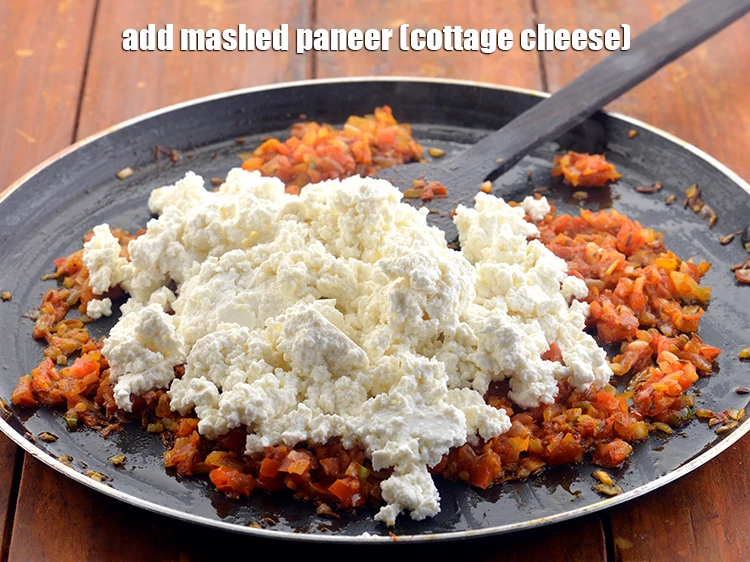 Step 14 – <p>Now add the <span style="background-color:rgb(255,255,255);color:rgb(0,0,0);">1 cup </span><a href="https://www.tarladalal.com/glossary-paneer-cottage-cheese-chenna-985i#ing_3094"><u>mashed paneer (cottage cheese)</u></a>. This paneer is crumbled …