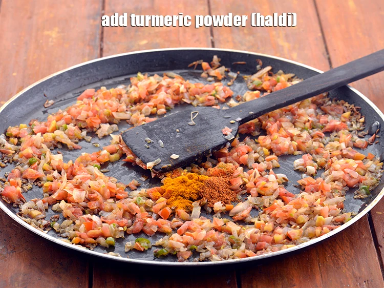 Step 10 – <p>Also add the <span style="background-color:rgb(255,255,255);color:rgb(0,0,0);">1/4 tsp </span><a href="https://www.tarladalal.com/glossary-turmeric-powder-haldi-645i"><u>turmeric powder (haldi)</u></a> to the <strong>Paneer Bhurji</strong> for …