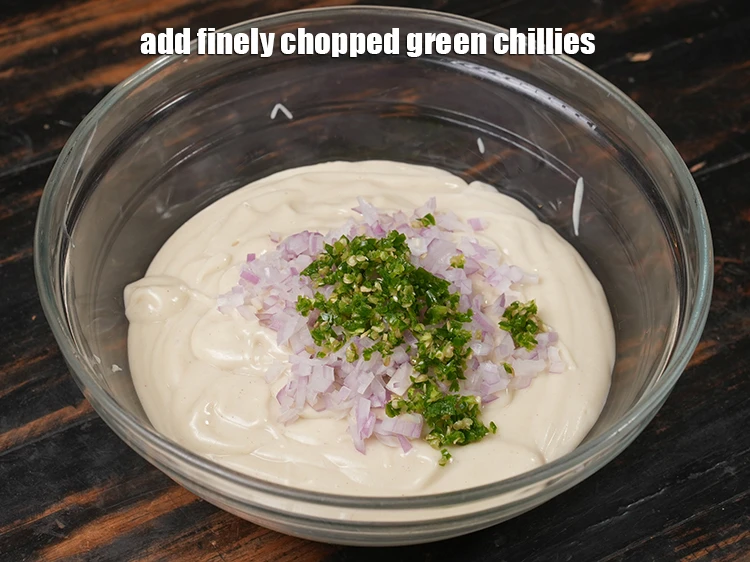 Step 11 – <p>Add <span style="background-color:rgb(255,255,255);color:rgb(0,0,0);">2 tsp </span><a href="https://www.tarladalal.com/glossary-green-chillies-hari-mirch-331i#ing_3504"><u>finely chopped green chillies</u></a><u>.</u></p>