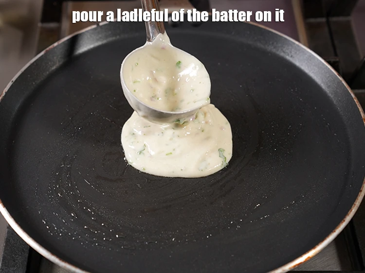 Step 17 – <p><span style="background-color:rgb(255,255,255);color:rgb(0,0,0);">Pour a ladleful of the <strong>batter</strong> on it.</span></p>