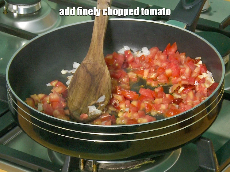 Step 20 – <p>Add <span style="background-color:rgb(255,255,255);color:rgb(0,0,0);">1 cup finely </span><a href="https://www.tarladalal.com/glossary-tomatoes-tamatar-639i#ing_2361"><u>chopped tomato</u></a><u>.</u></p>
