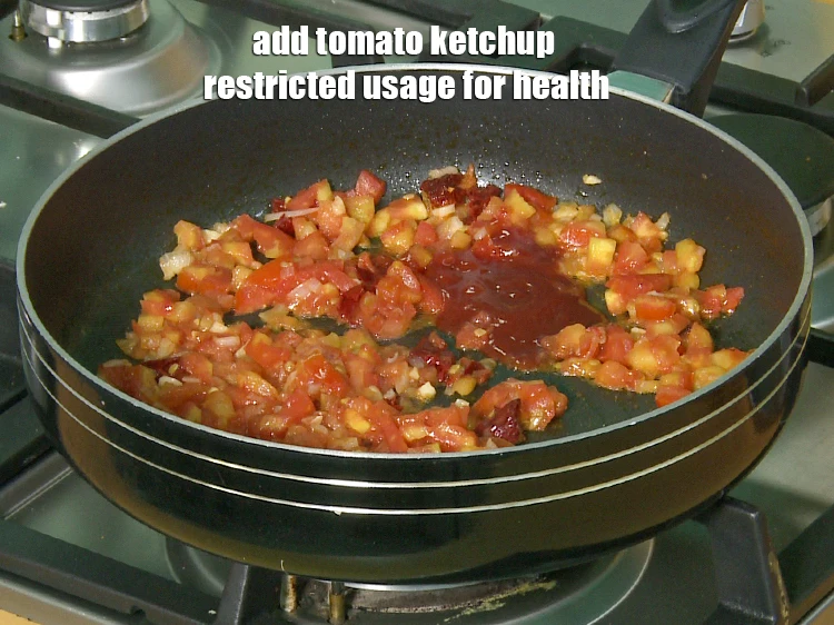 Step 23 – <p>Add <span style="background-color:rgb(255,255,255);color:rgb(0,0,0);">1 tbsp </span><a href="https://www.tarladalal.com/glossary-tomato-ketchup-tomato-sauce-181i"><u>tomato ketchup </u></a><span style="background-color:rgb(255,255,255);color:rgb(0,0,0);">restricted usage for health.</span></p>