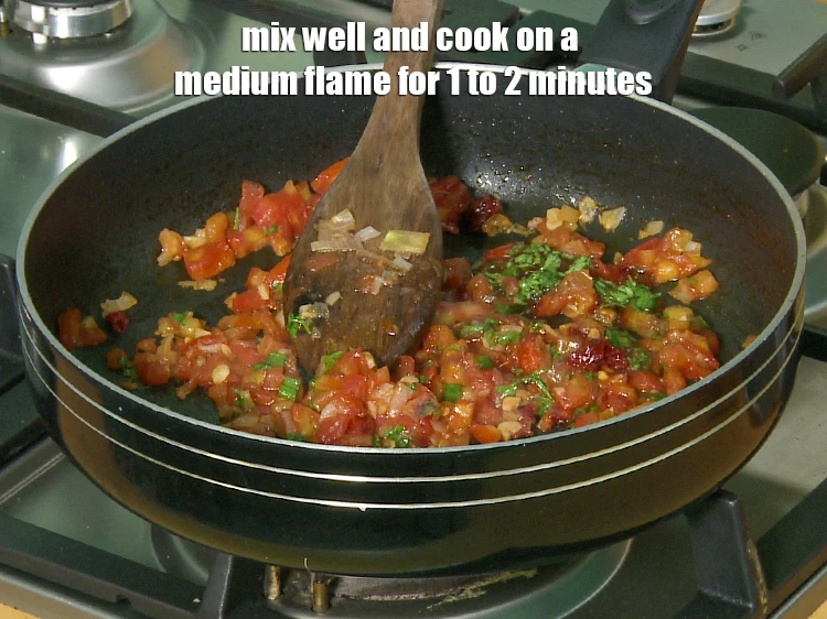 Step 27 – <p><span style="background-color:rgb(255,255,255);color:rgb(0,0,0);">Mix well and <strong>cook</strong> on a medium flame for 1 to 2 minutes.</span></p>