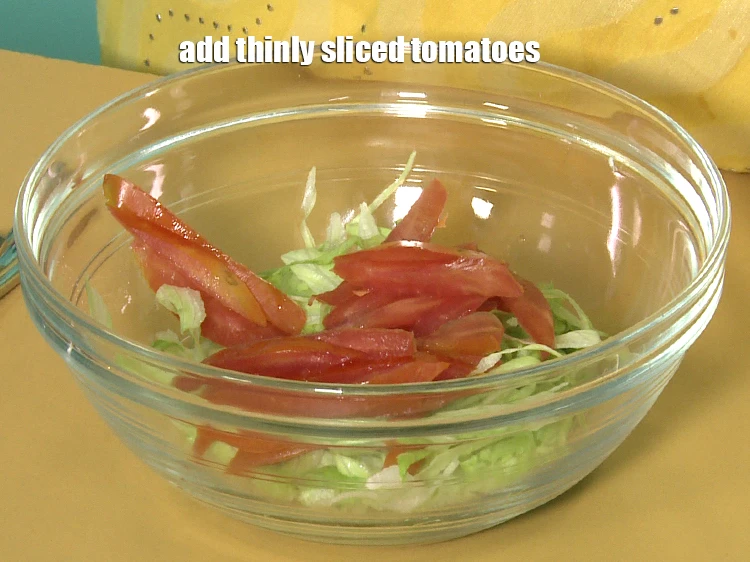 Step 30 – <p>Add <span style="background-color:rgb(255,255,255);color:rgb(0,0,0);">1/2 cup thinly </span><a href="https://www.tarladalal.com/glossary-tomatoes-tamatar-639i#ing_2343"><u>sliced tomatoes</u></a><u>.</u></p>