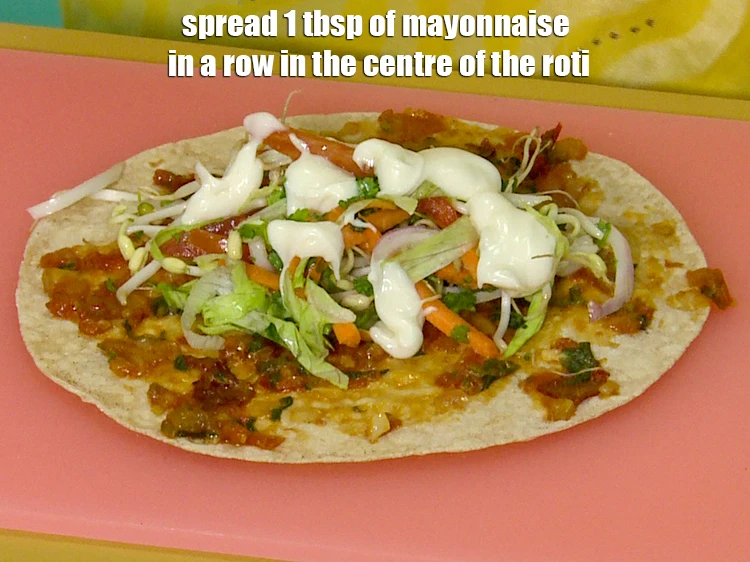Step 43 – <p><span style="background-color:rgb(255,255,255);color:rgb(0,0,0);">Spread 1 tbsp of </span><a href="https://www.tarladalal.com/glossary-low-calorie-mayonnaise-low-cal-mayonnaise-2007i"><u>low calorie mayonnaise</u></a><span style="background-color:rgb(255,255,255);color:rgb(0,0,0);"> in a row in the …