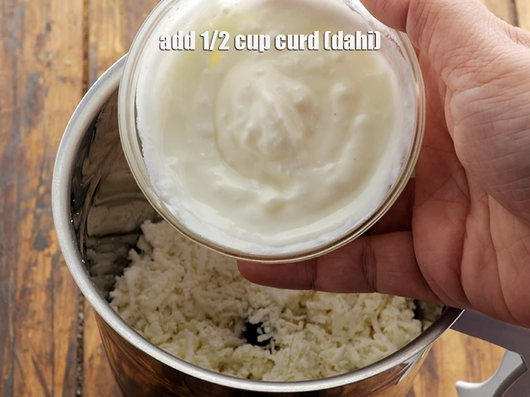 Step 2 – <p>Add <span style="background-color:rgb(255,255,255);color:rgb(0,0,0);">1/2 cup </span><a href="https://www.tarladalal.com/glossary-curd-dahi-yogurt-yoghurt-383i"><u>curd (dahi)</u></a><u>. and </u><span style="background-color:rgb(255,255,255);color:rgb(0,0,0);">1/4 cup </span><a href="https://www.tarladalal.com/glossary-powdered-sugar-280i"><u>powdered sugar</u></a><u>.</u></p>