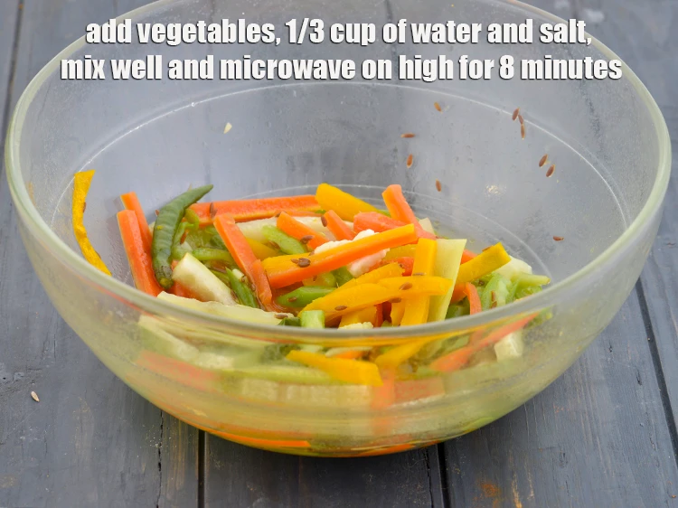 Step 6 – <p>Add <span style="background-color:rgb(255,255,255);color:rgb(0,0,0);">1/3 cup </span><a href="https://www.tarladalal.com/glossary-bottle-gourd-lauki-doodhi-ghiya-252i#ing_2452"><u>sliced bottle gourd (doodhi / lauki)</u></a>, <span style="background-color:rgb(255,255,255);color:rgb(0,0,0);">1/3 cup </span><a …